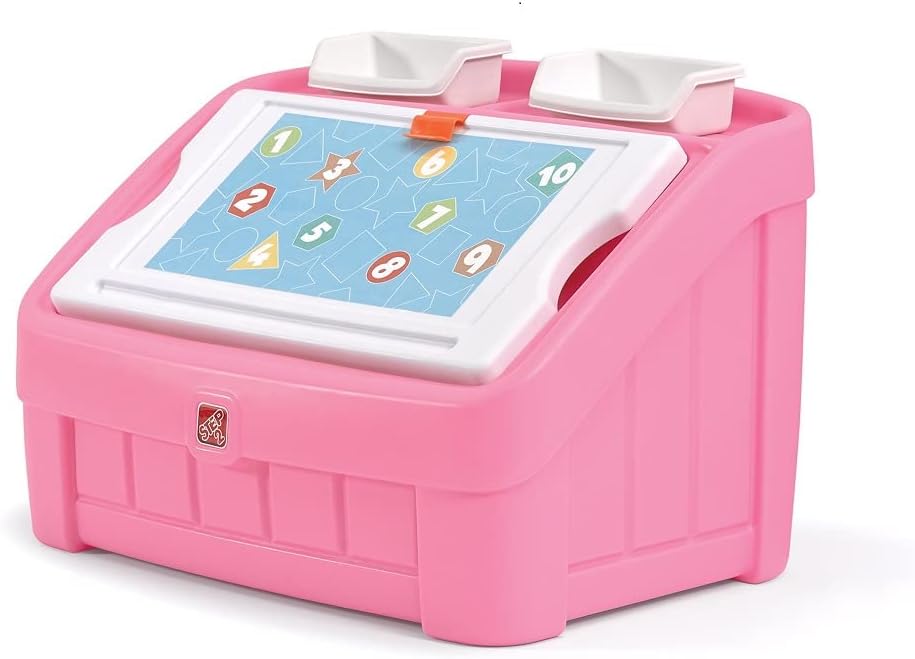 Child opening the Step2 toy box in a bright playroom